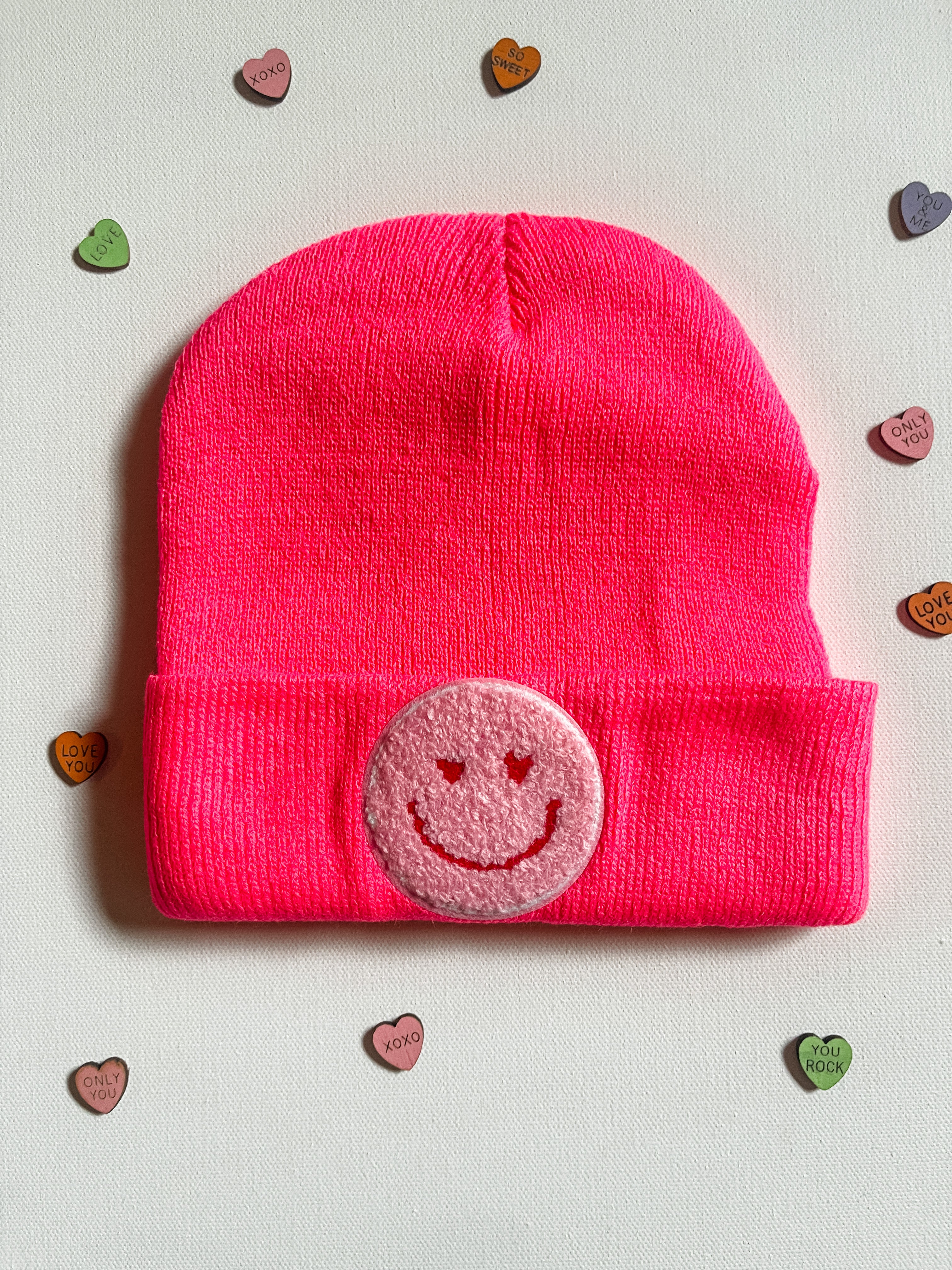 Hot pink smiley face beanie